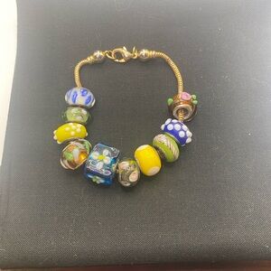 Gold Tone Snake Bracelet with Glass Charms